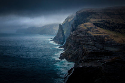 Rugged shores of Vagar Islands in the Faroe Islands fine art photography print dramatic cliffs dark ocean