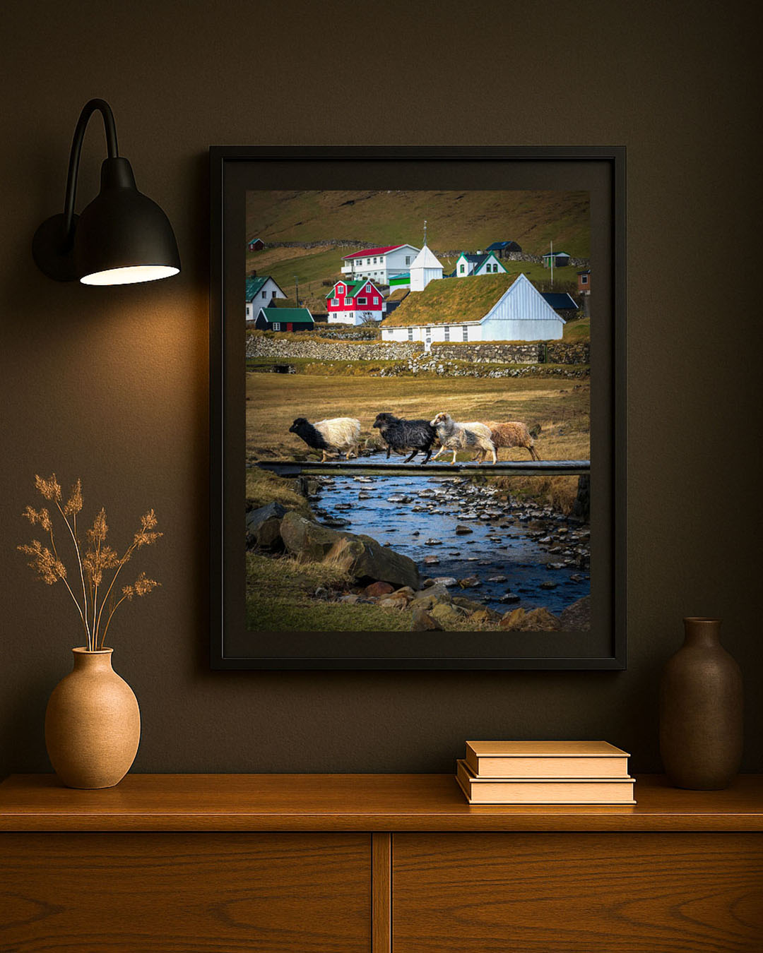 Faroe Islands photography print displayed framed on a wall, sheep crossing a wooden bridge in Húsavík village